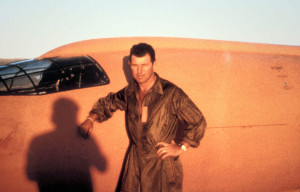 Capt Chuck Yeager standing next to X-1 
